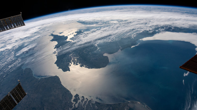 Earth ocean landforms satellite cityscape free wallpaper - medium preview image