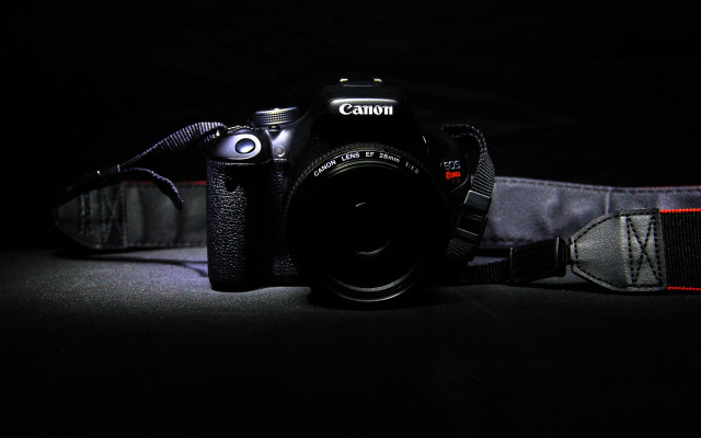 Camera strap on macro dark free wallpaper - medium preview image