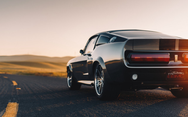 Black car road field hill free wallpaper - medium preview image