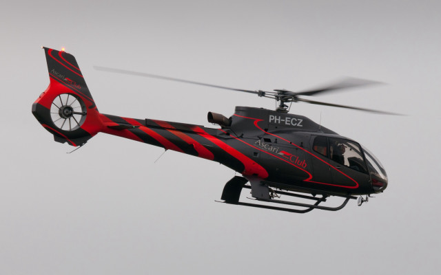 Helicopter gray sky red stripe free wallpaper - medium preview image