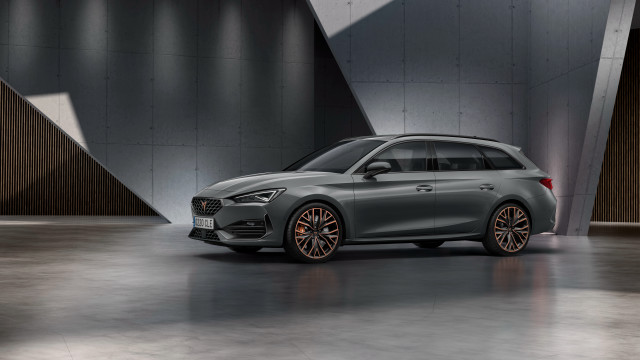 Grey car parked large room free wallpaper - medium preview image