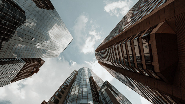 Cityscape skyline tallbuildings clouds fence free wallpaper - medium preview image