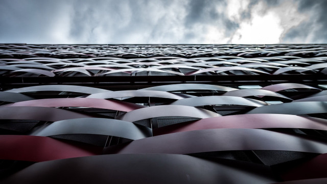 Umbrellas parking lot cloudy sky free wallpaper - medium preview image