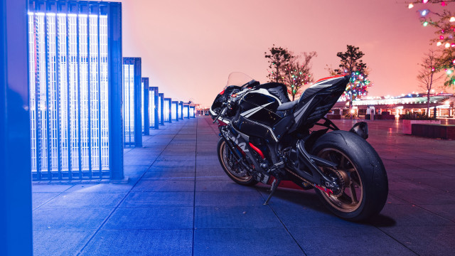 Motorcycle fence cherryblossoms city pavement free wallpaper - medium preview image