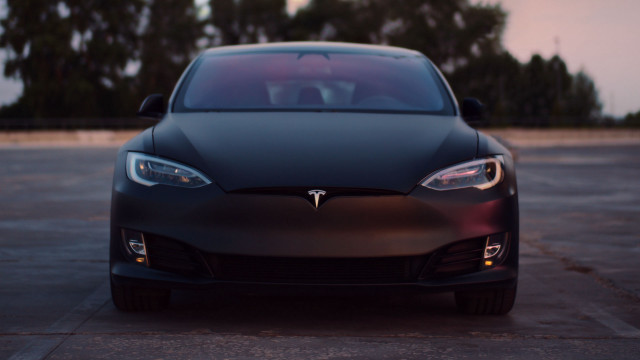 Black tesla parking lot dusk free wallpaper - medium preview image