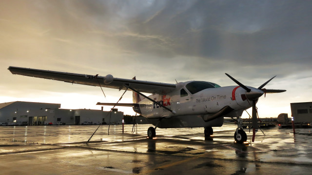 Small airplane tarmac cloudy sky free wallpaper - medium preview image