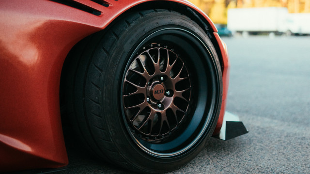 Red sports car black rim #3 free wallpaper - medium preview image