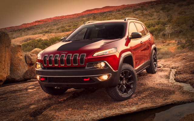 Red jeep rocky hillside water free wallpaper - medium preview image