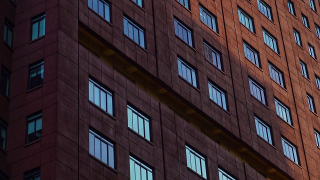 Tall building many windows clock free wallpaper - medium preview image