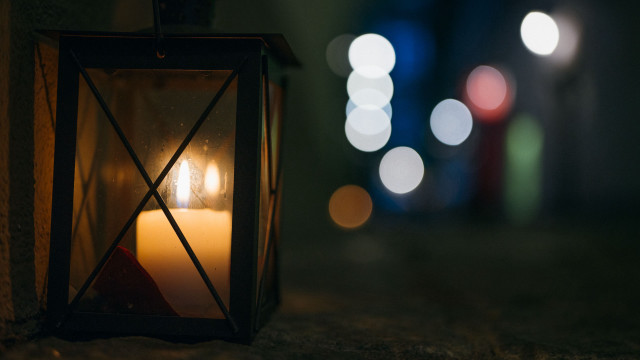 Lit candle bokeh moonlight night free wallpaper - medium preview image