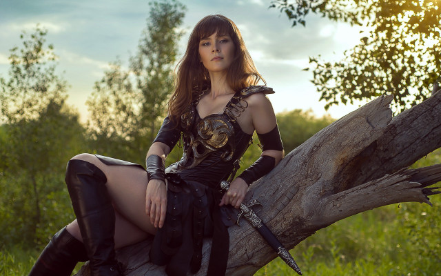 Woman cosplay sitting tree branch free wallpaper - medium preview image