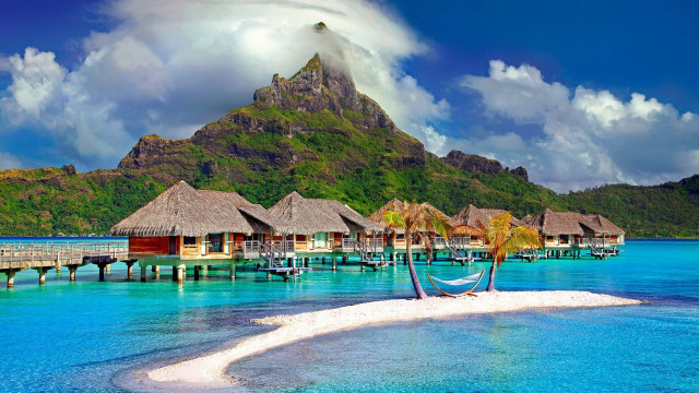 Tropical island dock thatched huts free wallpaper - medium preview image