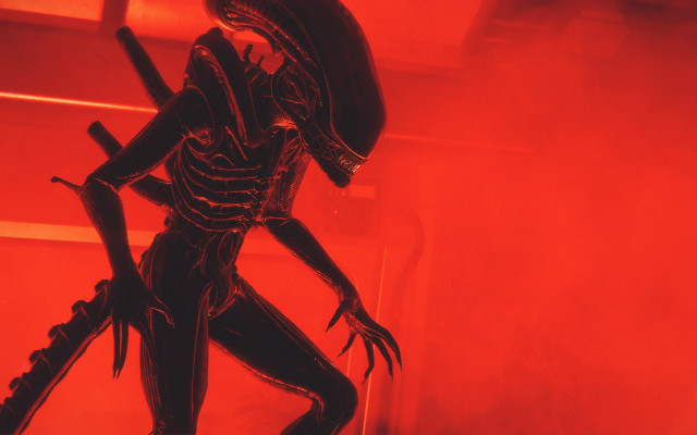 Alien statue red room glowing free wallpaper - medium preview image