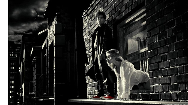 Man woman ledged brick building free wallpaper - medium preview image