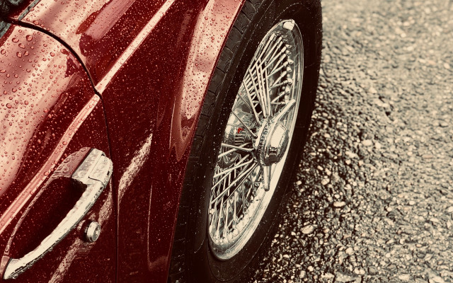 Red car rainy tires night free wallpaper - medium preview image