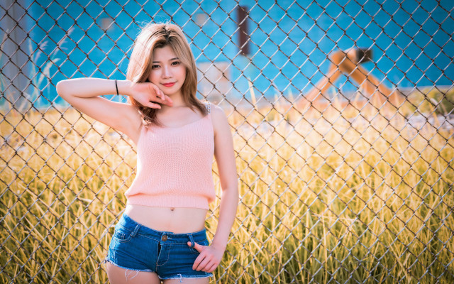 Woman fence hand head cheek free wallpaper - medium preview image