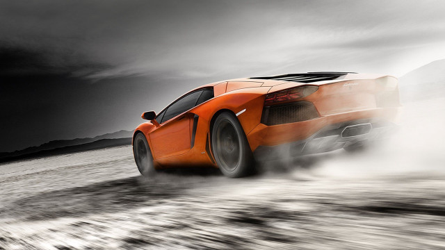 Orange car dusty tires motion free wallpaper - medium preview image