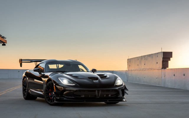 Black sports car sunset crane free wallpaper - medium preview image