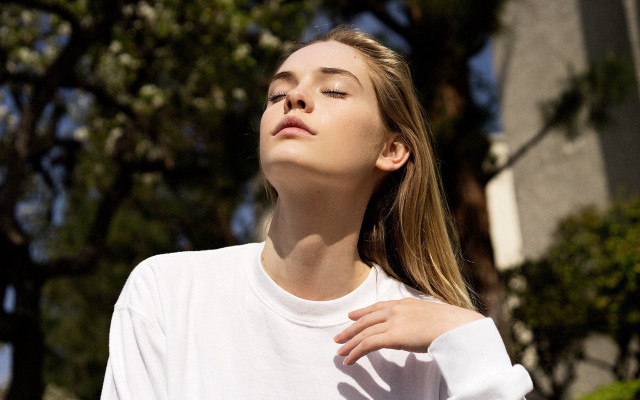 Woman white shirt tree building free wallpaper - medium preview image