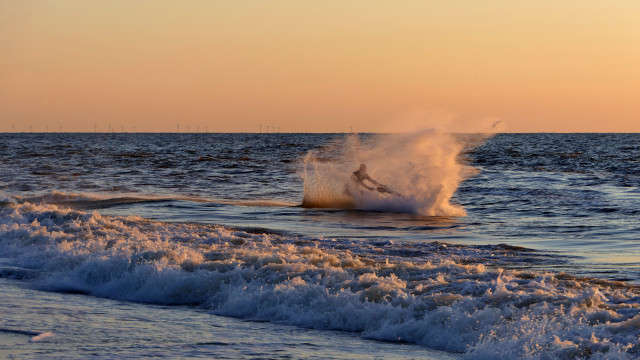 Surfboard wave ocean sunset impressionist free wallpaper - medium preview image