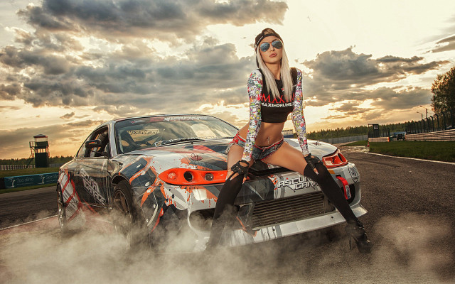 Woman car track cloudy sky free wallpaper - medium preview image