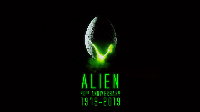 Green alien head planet glowing free wallpaper - medium preview image