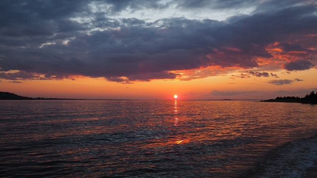 Sunset water boat clouds cityscape free wallpaper - medium preview image