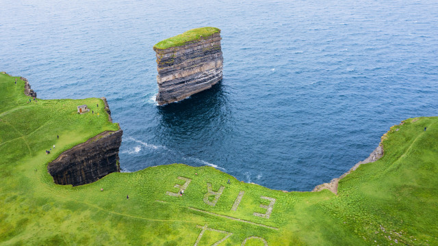 Rock formation water land art free wallpaper - medium preview image