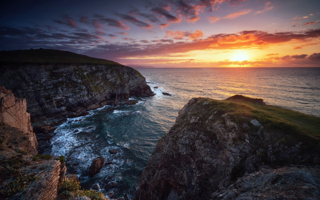 Sunset ocean rocky cliff boat free wallpaper - medium preview image
