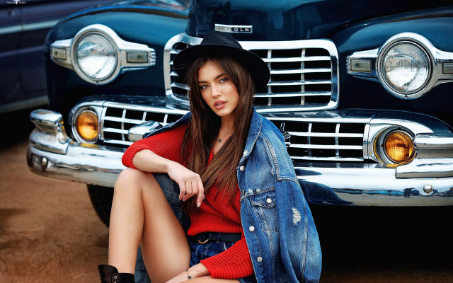 Woman jean jacket hat sitting free wallpaper - medium preview image
