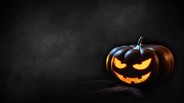 Carved pumpkin glowing eyes gothic free wallpaper - medium preview image