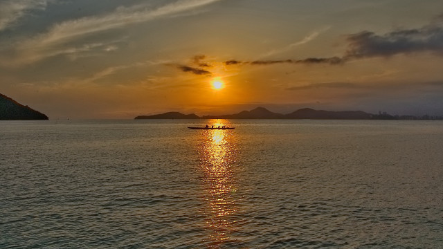 Sunset mountain boat water cityscape free wallpaper - medium preview image