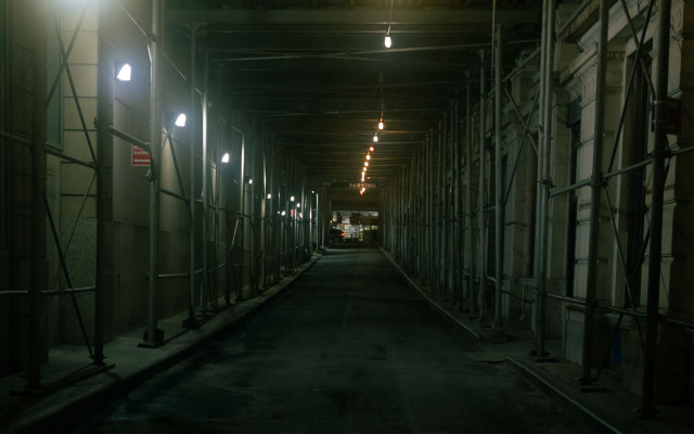 Dark alley scaffolding lights streetsign free wallpaper - medium preview image