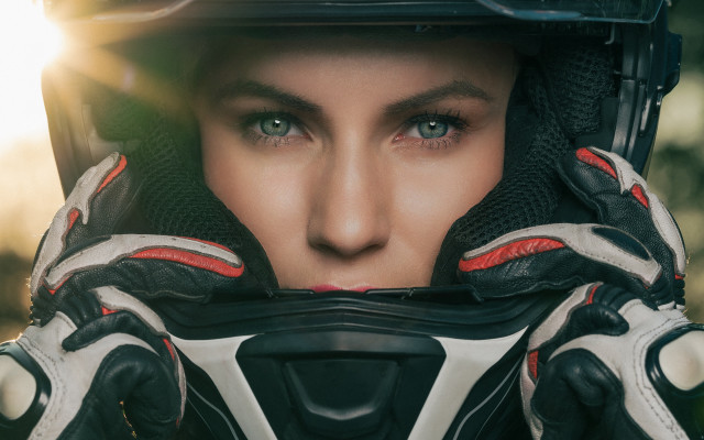 Woman helmet gloves sunshine portrait free wallpaper - medium preview image