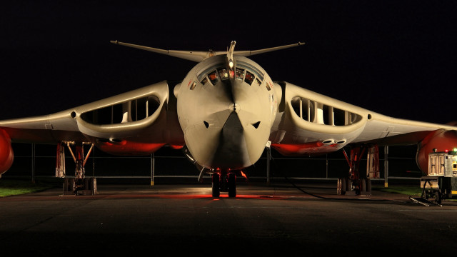 Large airplane runway night man free wallpaper - medium preview image