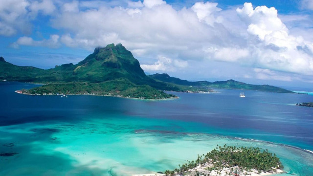 Tropical island sailboat mountain clouds free wallpaper - medium preview image