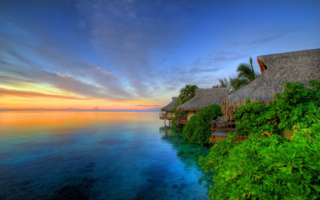 Tropical resort sunset water thatched free wallpaper - medium preview image