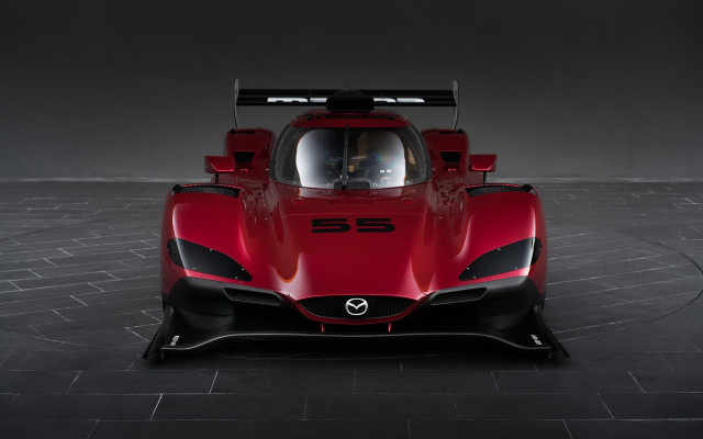 Red sports car black floor free wallpaper - medium preview image