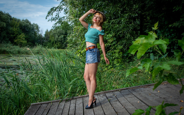 Woman boardwalk pond trees blue free wallpaper - medium preview image