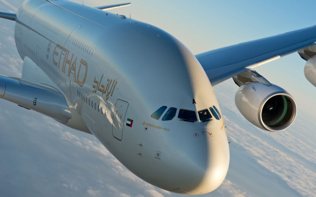 Jetliner blue sky clouds jet free wallpaper - medium preview image