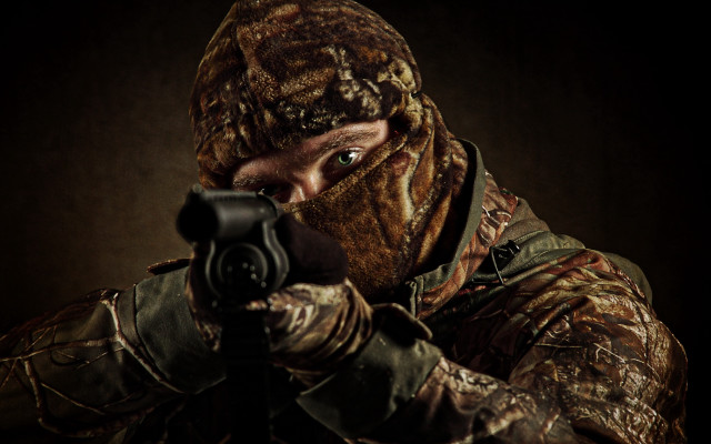 Camouflage man gun aiming serious free wallpaper - medium preview image
