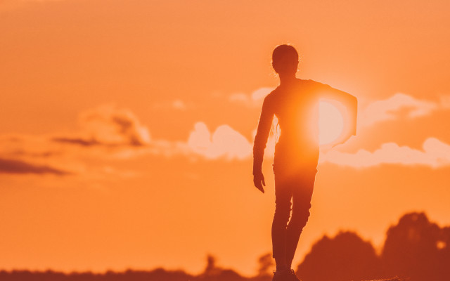 Man surfboard rock sunset silhouette free wallpaper - medium preview image