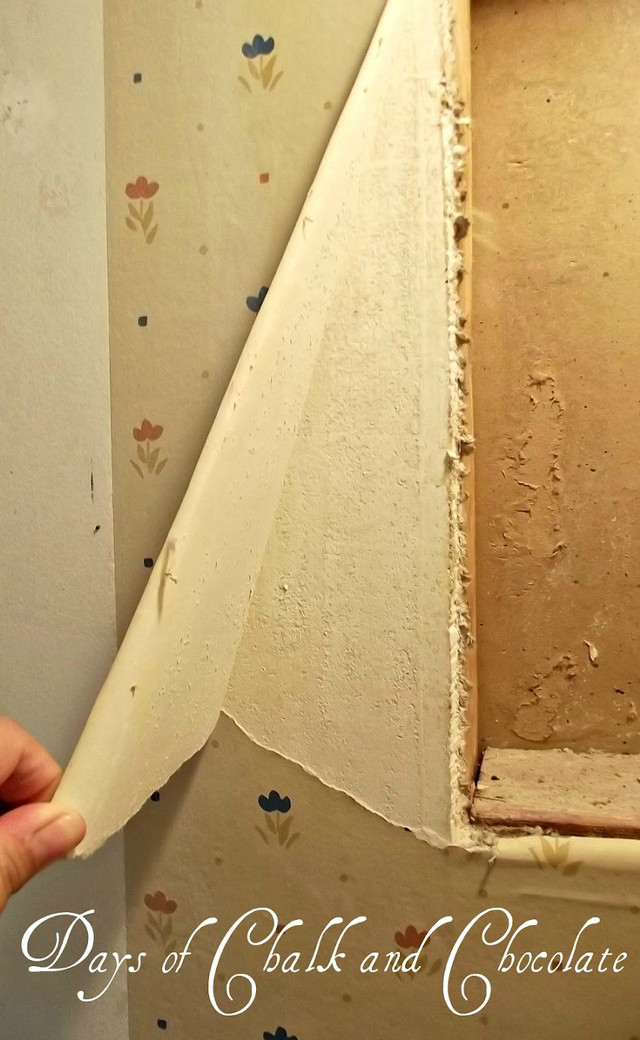 Person holding paper window torn free wallpaper - medium preview image