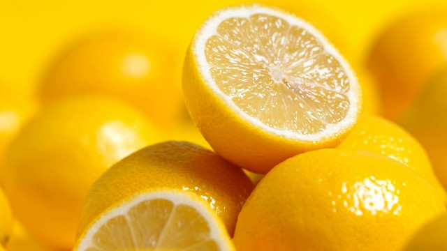 Lemon pile yellow surface rayonism free wallpaper - medium preview image