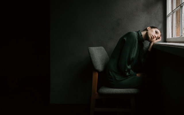 Woman sitting chair window cinematic free wallpaper - medium preview image