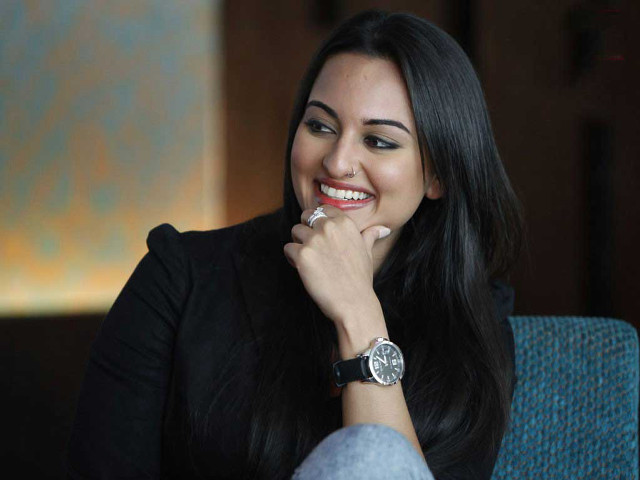 Woman smiling holding watch looking free wallpaper - medium preview image