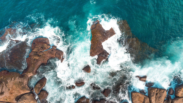 Ocean view rocks waves boat free wallpaper - medium preview image