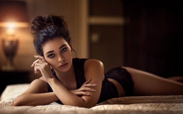 Seductive portrait blackhair browneyes laying free wallpaper - medium preview image