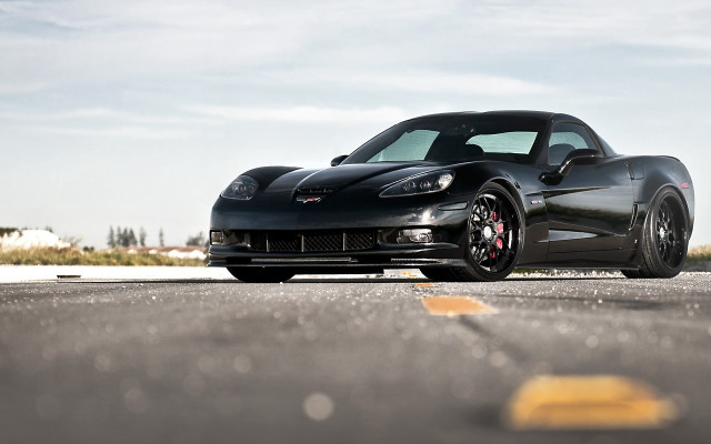 Black sports car parking lot #13 free wallpaper - medium preview image