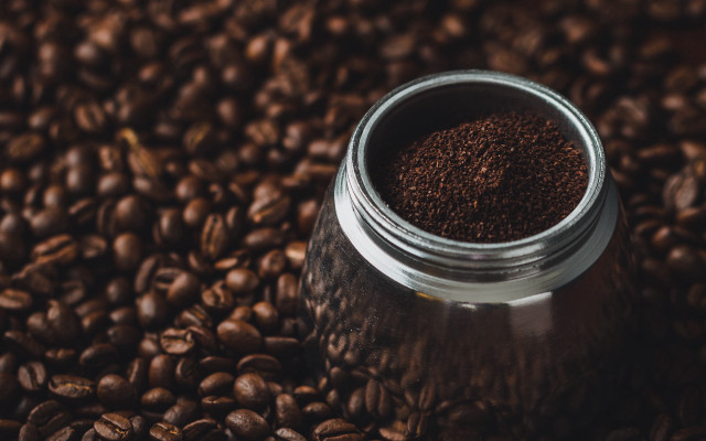 Coffee jar on beans bokeh free wallpaper - medium preview image